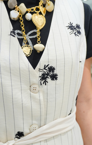 Gilet con stampa floreale gessata