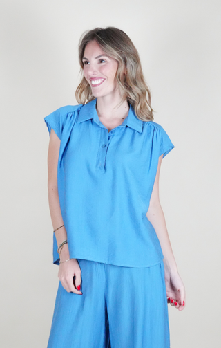 blusa bottoncini azzurro