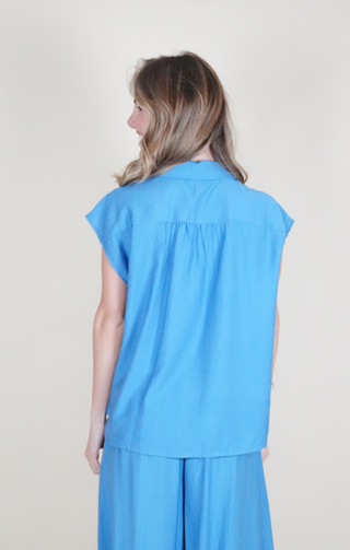 blusa bottoncini azzurro