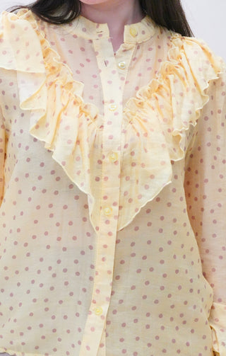 Blusa con volant e pois giallo