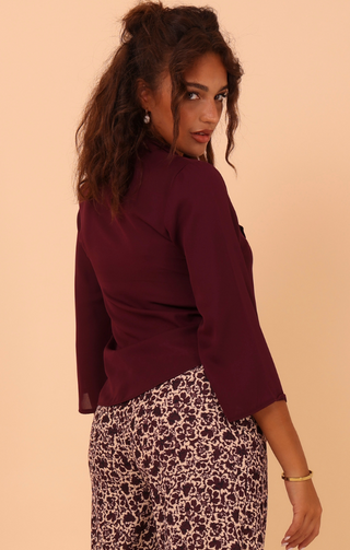 Blusa con fiocco