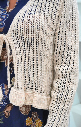 Cardigan corto con fiocco panna