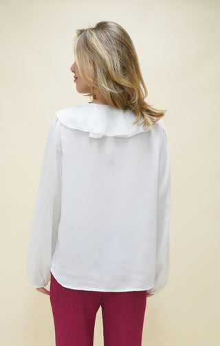 Blusa con volant panna