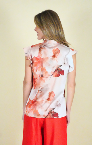 Blusa floreale con bottoni frontali