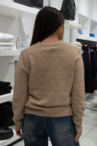 Maglioncino con applicazioni floreali beige